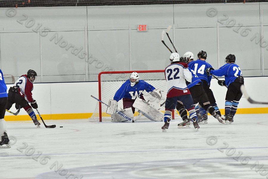 Wheaton College Men\'s Ice Hockey vs Middlesex Community College. - Photo By: KEITH NORDSTROM
